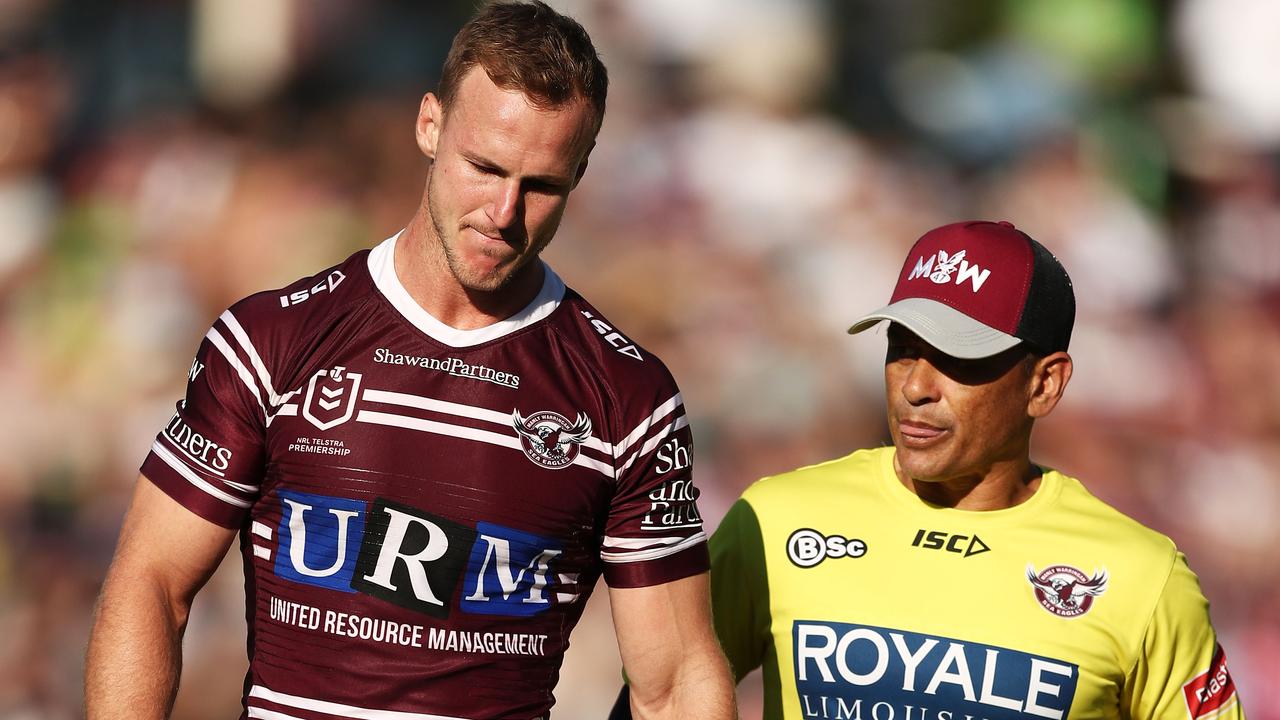 Daly Cherry-Evans is assisted from the field during Manly’s win over Canberra. Picture: Getty Images