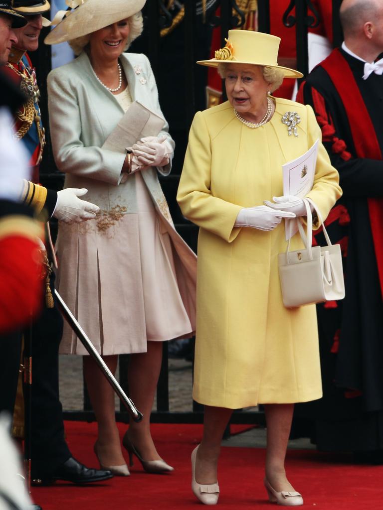 Queen Elizabeth II often matches her dresses with hats. Picture: Dan Kitwood/Getty Images