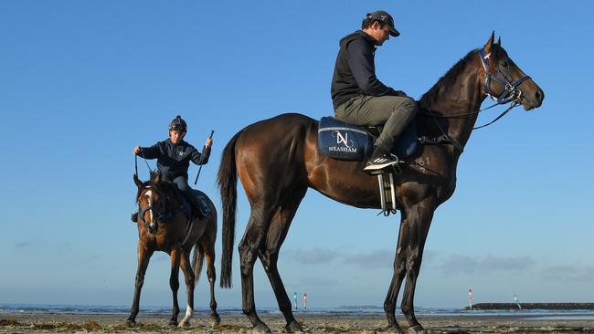 Zaaki (left) and Mo'unga (right) during a Melbourne beach session. Picture: Getty Images