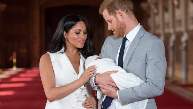 Prince Harry and wife Meghan Markle rolled out son Archie Harrison Mountbatten-Windsor on the first podcast of their $52m deal with Spotify. Picture: AFP