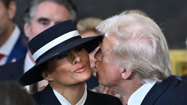 Trump kisses wife Melania as he arrives for the inauguration ceremony. Picture: AFP