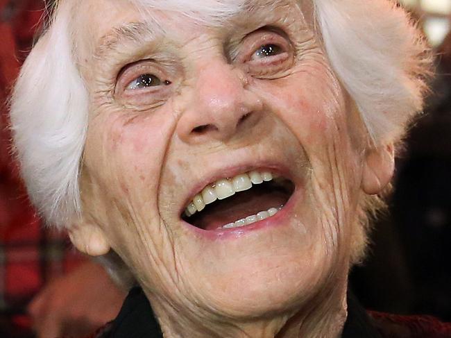 Ingeborg Syllm-Rapoport holds up her doctoral certificate during a ceremony at the University Clinic Hamburg-Eppendorf in Hamburg, Germany, Tuesday, June 9, 2015. Syllm-Rapoport wasn't allowed to defend her doctoral thesis in 1938 under the Nazis because she was part-Jewish. Now, 77 years later, she's completed all the requirements and is becoming Germany's oldest recipient of a doctorate at age 102. (Bodo Marks/dpa via AP)