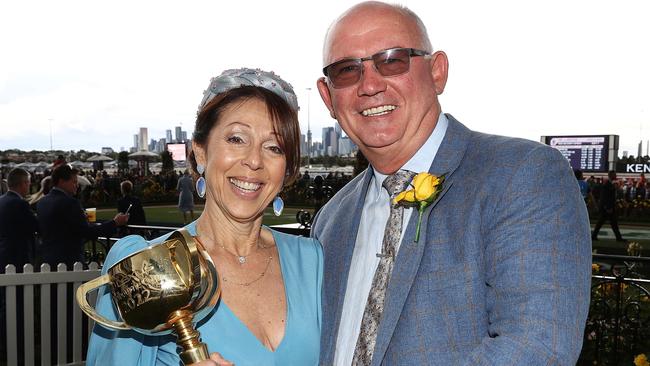 MELBOURNE . 31/10/2022.  RACING.  Melbourne Cup Day races at Flemington racecourse.  Race 7. The Melbourne Cup. (3200 mtr).  Part owner of Gold Trip Noel Greenhalgh and with Maria with the Melbourne Cup    . Picture by Michael Klein