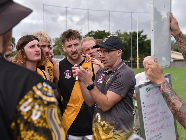 Pictured: Departing Tigers coach Sam Hughes gives half-time speech. AFL Cairns 2024. Supplied by AFL Cairns