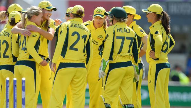 Australia celebrate a wicket against India in their semi-final match. The team’s bowling performance didn’t go to plan.