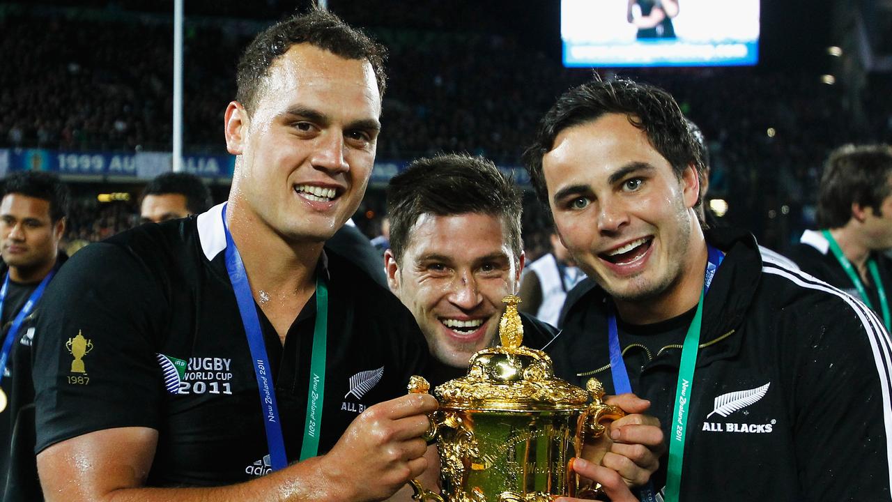 AUCKLAND, NEW ZEALAND - OCTOBER 23: (L-R) Israel Dagg, Cory Jane and Zac Guildford of the All Blacks pose with the Webb Ellis Cup after the 2011 IRB Rugby World Cup Final match between France and New Zealand at Eden Park on October 23, 2011 in Auckland, New Zealand. (Photo by Phil Walter/Getty Images)