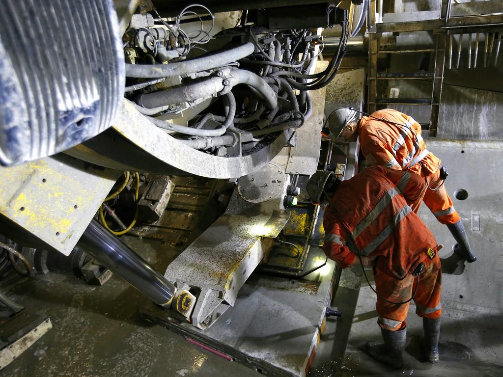 Workmen underground laying Ring 636 in the North West Rail Link tunnel. The North West Rail Link is underway and TBM Elizabeth has cut through 1092metres of earth travelling East from Bella Vista. Picture: Bradley Hunter