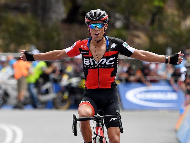 Australian rider Richie Porte of team BMC Racing celebrates winning stage five of the Tour Down Under from McLaren Vale to Willunga Hill, South Australia, Saturday, January 20, 2018. (AAP Image/Dan Peled) NO ARCHIVING, EDITORIAL USE ONLY