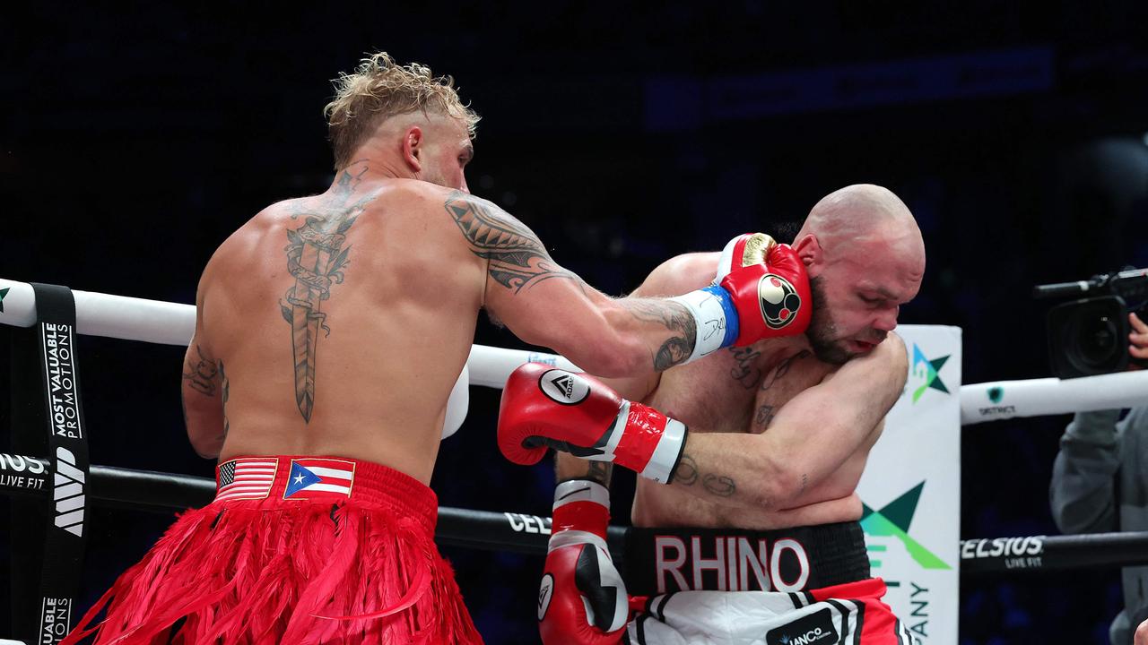 Paul lands a shot on his opponent. Al Bello/Getty Images/AFP.