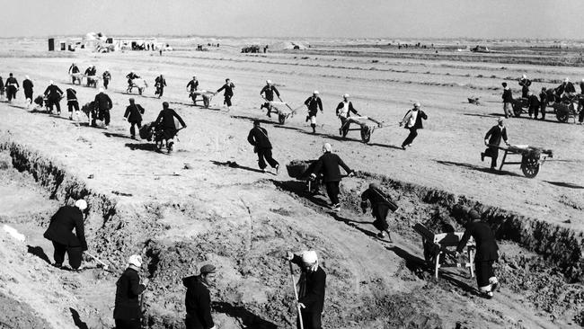 Chinese peasants farming on a communal farm in the 1950s during the Great Leap Forward. Picture: Universal History Archive/Universal Images Group, via Getty Images