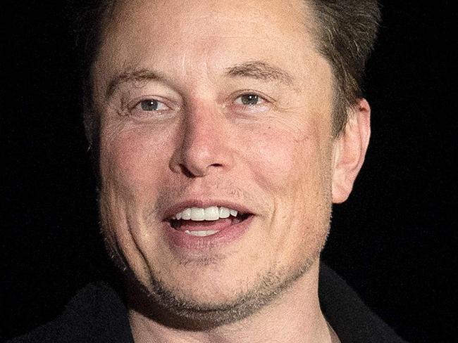 (FILES) In this file photo taken on February 10, 2022 Elon Musk gestures as he speaks during a press conference at SpaceX's Starbase facility near Boca Chica Village in South Texas. - Elon Musk faces a lawsuit filed May 25, 2022 accusing him of pushing down Twitter's stock price in order to either give himself an escape hatch from his $44 billion buyout bid, or room to negotiate a discount. The suit alleges the billionaire Tesla boss tweeted and made statements intended to create doubt about the deal, which has roiled the social media platform for weeks. (Photo by JIM WATSON / AFP)