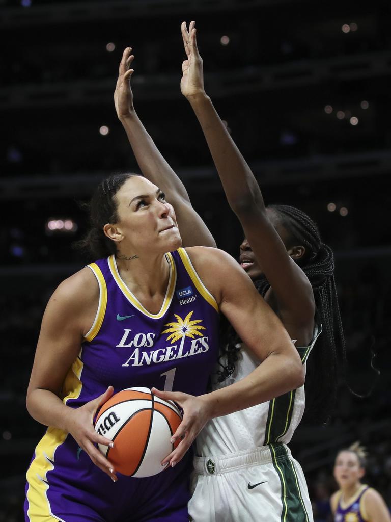 Los Angeles Sparks center Liz Cambage brings the ball up court