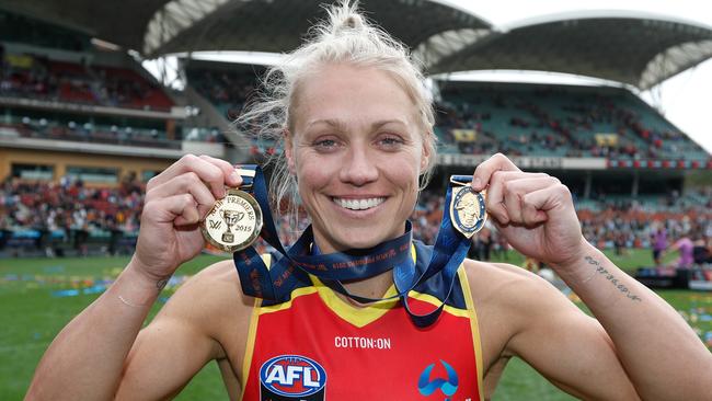 Erin Phillips of the Crows with her AFLW Premiership Medal and Best On Ground Medal from the 2019 AFLW Grand Final. Picture: Michael Willson/AFL Photos