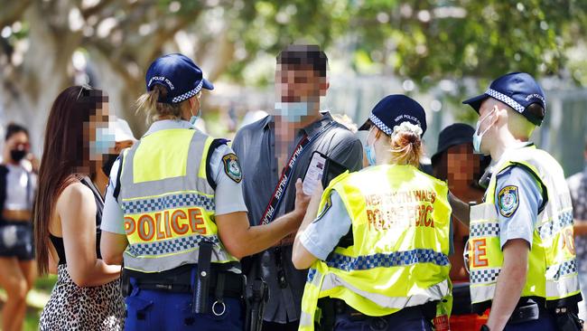 Police sniffer dogs were used throughout the day, with 85 people charged with drug offences. There is no suggestion the people in this picture were in possession of drugs. Picture: Sam Ruttyn