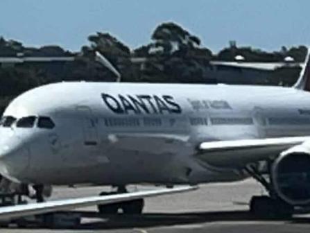 Emergency services on the tarmac at Sydney Airport after Qantas flight drama