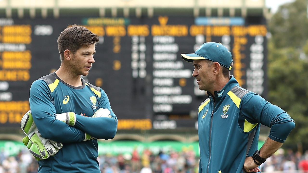 Tim Paine and Justin Langer chat before a Test in Adelaide.