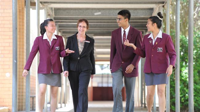 Tanya Costillas, 16, principal Janice Dostra, Sidharth Autar, 16, and Jaanvi Kapadia, 16, at Macquarie Fields High School.