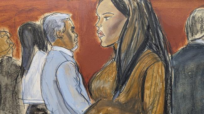 Cassie Ventura, right, walks out of the courtroom past Sean Diddy Combs after testifying. Picture: Elizabeth Williams via AP