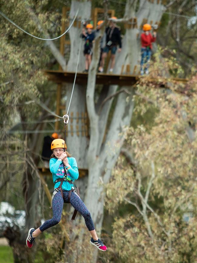 Ember Hewison on the zipline at TreeClimb in the south parklands.