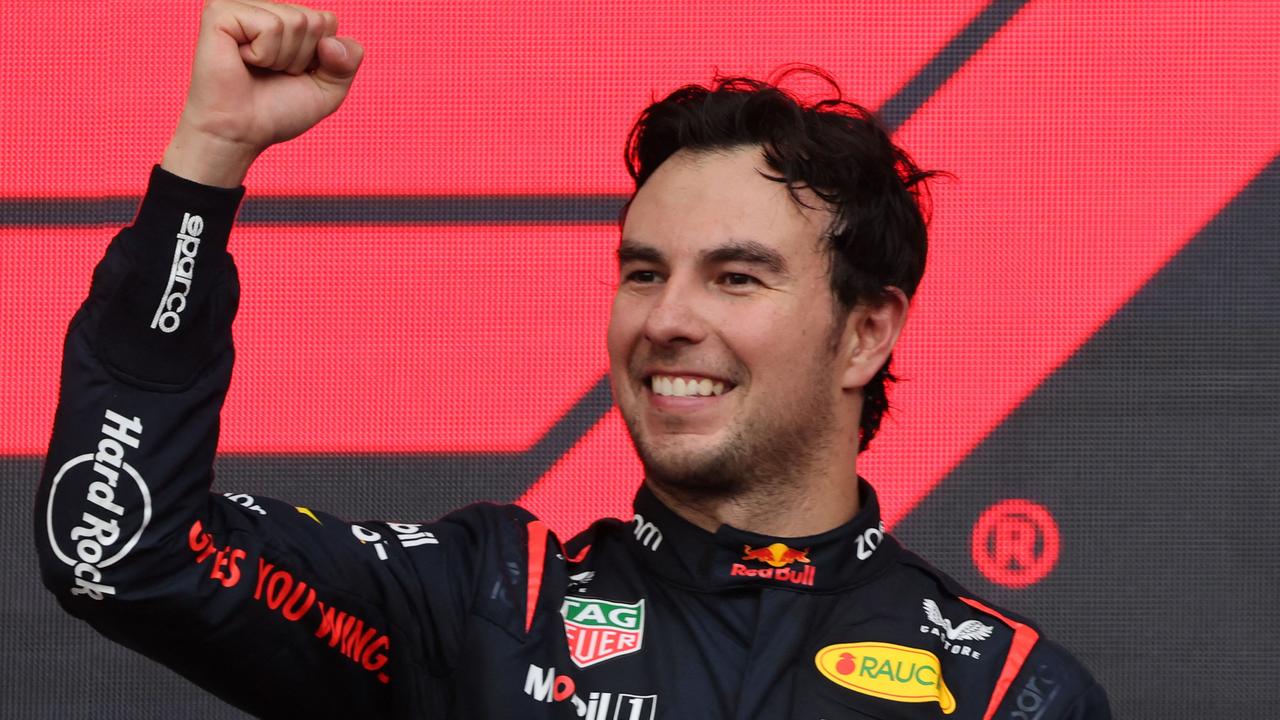 Sergio Perez celebrates another street circuit win. (Photo by Giuseppe CACACE / AFP)