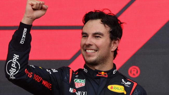 Sergio Perez celebrates another street circuit win. (Photo by Giuseppe CACACE / AFP)