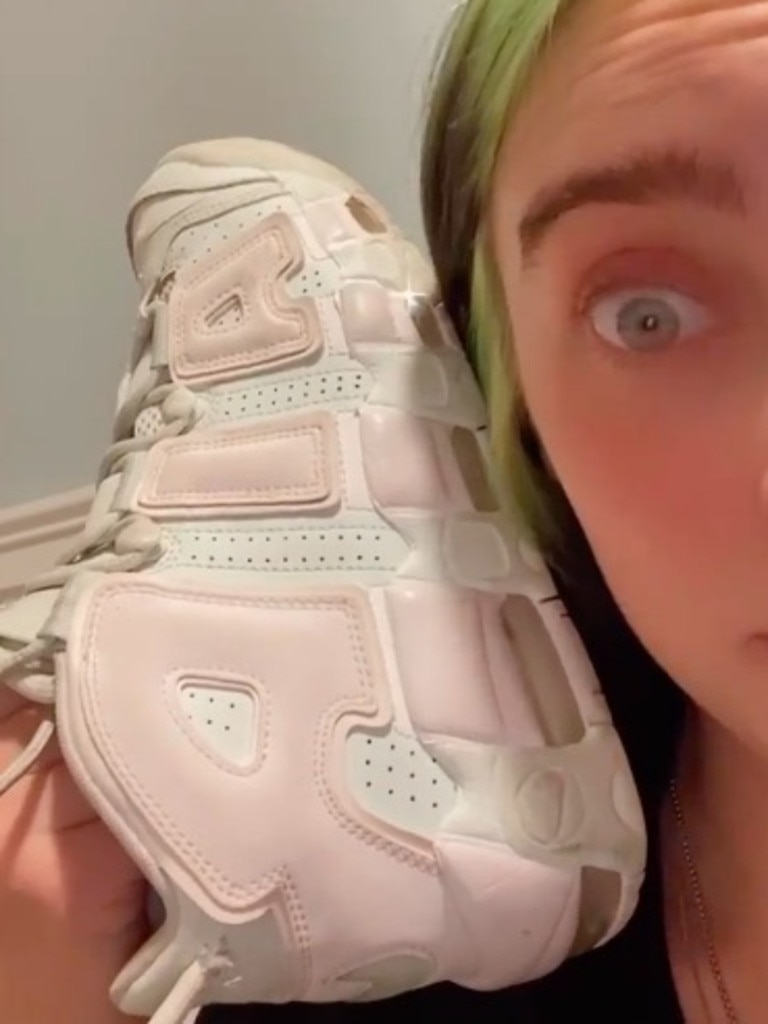 prompthunt: billie eilish with SILVER HAIR in Nike and Louis