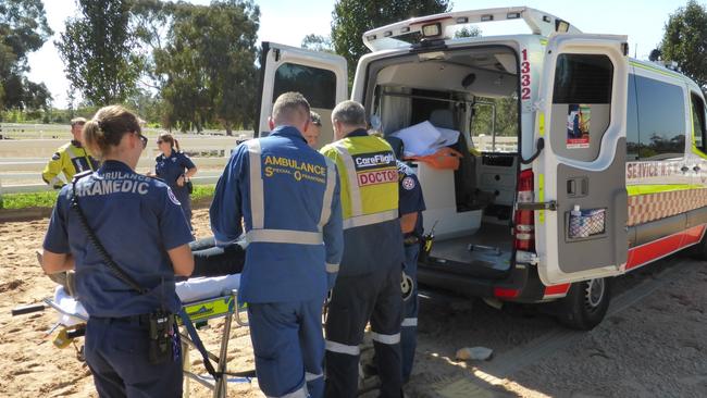 The woman was taken to Westmead Hospital by ambulance.