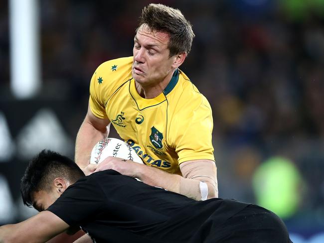 DUNEDIN, NEW ZEALAND - AUGUST 26:  Dane Haylett-Petty of the Wallabies is tackled by Rieko Ioane of the All Blacks during The Rugby Championship Bledisloe Cup match between the New Zealand All Blacks and the Australia Wallabies at Forsyth Barr Stadium on August 26, 2017 in Dunedin, New Zealand.  (Photo by Phil Walter/Getty Images)