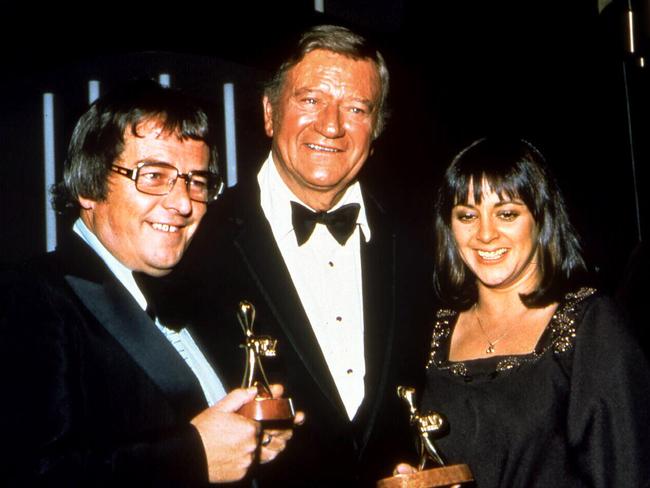 Ernie Sigley, John Wayne and Denise Drysdale. 1975.