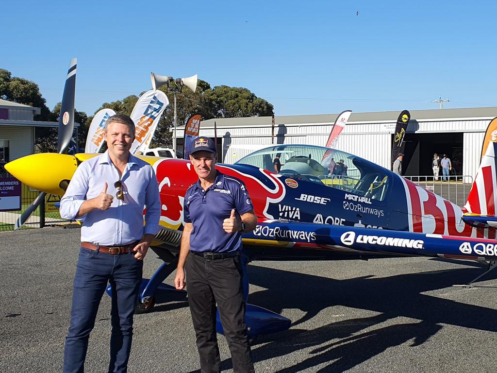 Wentworth Mayor Daniel Linklater and Matt Hall pose in front of one of the many planes on display AusFly 24