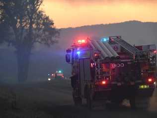 Fire fighters at the scene of the blaze at Tabulam. Picture: Marc Stapelberg