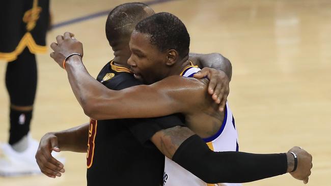 LeBron James and Kevin Durant embrace after the game. Picture: Getty Images