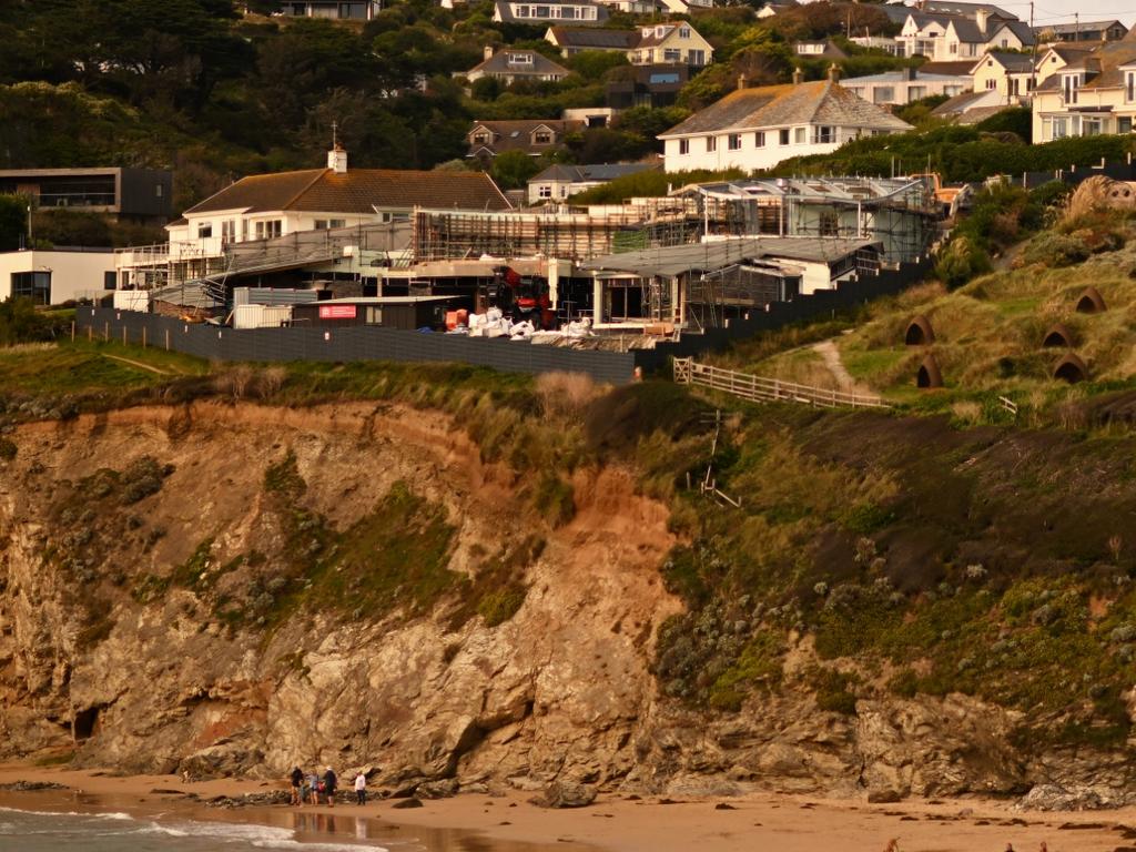 Cate Blanchett’s holiday house, surrounded by fencing, sits on the Mawgan Porth coastal trail. Picture: Getty Images