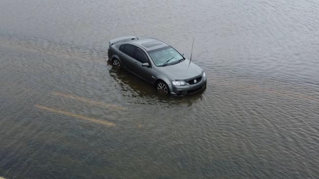 Flooding on the Bruce Highway at Goorganga Plains between Mackay and Proserpine. Picture: Daniel Hair/Severe Weather Australia.