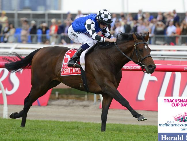 Ryan Moore wins the 2014 Emirates Melbourne Cup aboard Protectionist at Flemington Racecourse on Melbourne Cup Day TrackSnaps 2014 Picture: Stephen Harman