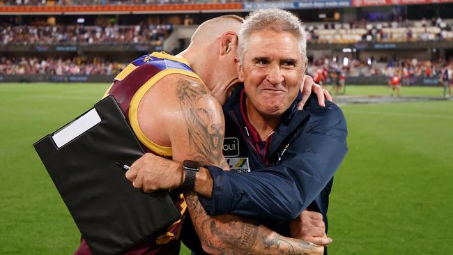 BRISBANE, AUSTRALIA – OCTOBER 02: Mitch Robinson of the Lions and Chris Fagan, Senior Coach of the Lions celebrate during the 2020 AFL Second Qualifying Final match between the Brisbane Lions and the Richmond Tigers at The Gabba on October 02, 2020 in Brisbane, Australia. (Photo by Michael Willson/AFL Photos via Getty Images)