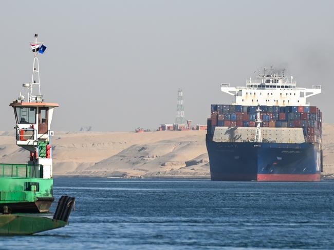 ISMAILIA, EGYPT - JANUARY 10: A ship transits the Suez Canal towards the Red Sea on January 10, 2024 in Ismailia, Egypt. In the wake of Israel's war on Gaza after the October 7 Hamas attack on Israel, Houthi rebels in Yemen pledged disruption on all ships destined for Israel through the Red Sea's Suez Canal. The disruption on world trade is evident in the number of companies using this container ship route - a 90 per cent decline compared to figures one year ago. (Photo by Sayed Hassan/Getty Images)