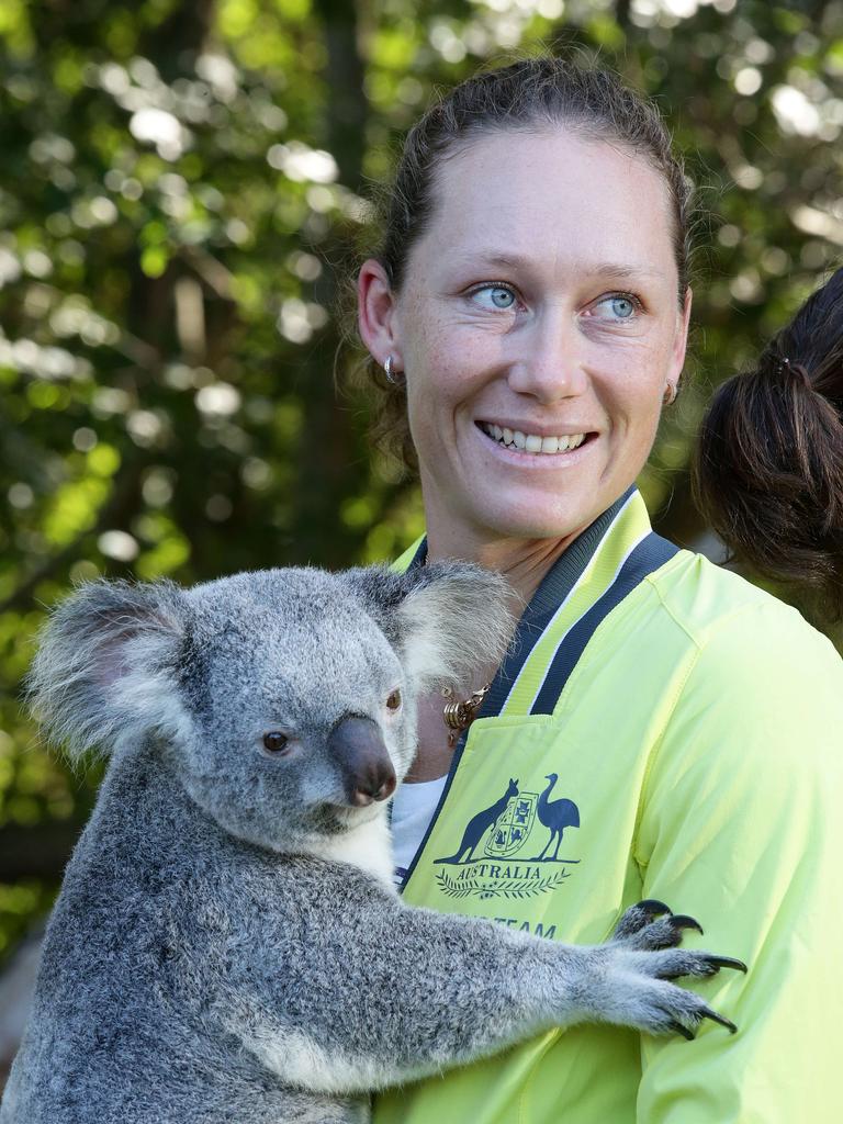 Samantha Stosur holding a koala, Australian and German tennis players at the Fed Cup draw, Lone Pine, St. Lucia. Photo: Liam Kidston.