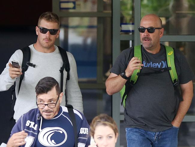 Darren Lehmann (R) and Aaron Finch leave St Vincent's Hospital after visiting Phillip Hughes. Picture: AAP