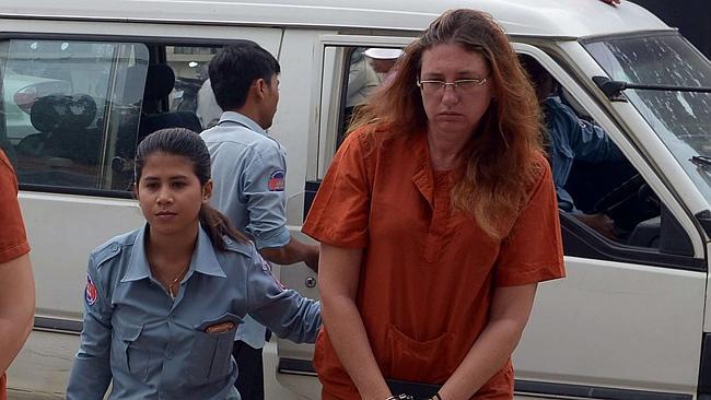 Queensland mum Yoshe Ann Taylor are escorted by Cambodian prison guards at the Phnom Penh