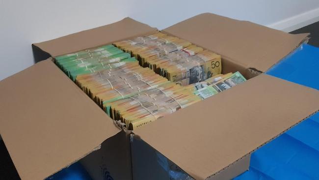 Cash allegedly seized in the police raids.