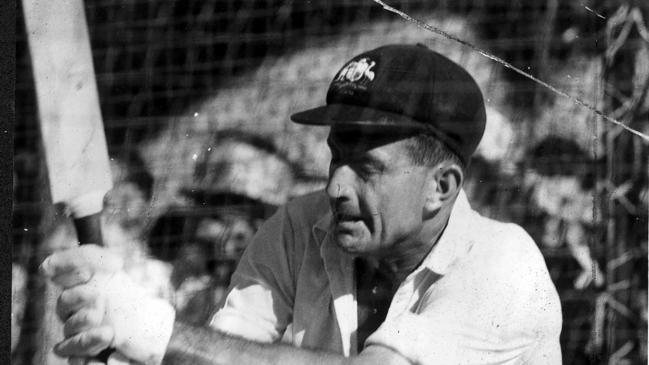 Aust cricketer Ken Mackay batting during cricket practice session in nets c. 1950s. net