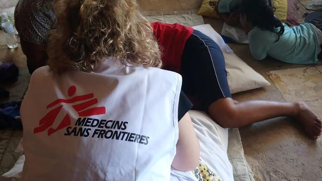 A patient on Nauru is treated by a member of the non-political Doctors Without Borders Australia. The Nauruan government kicked the group out last week, ending free medical care for asylum seekers. Picture: Doctors Without Borders Australia via AP