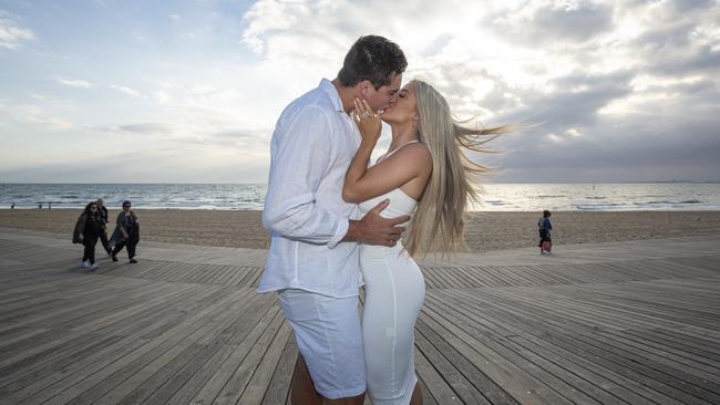 Chloe Roberts and Dean Barrand at St Kilda Beach. Picture: Daniel Pockett