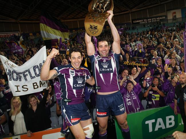 Billy Slater and Cameron Smith celebrate after the 2012 NRL Grand Final.