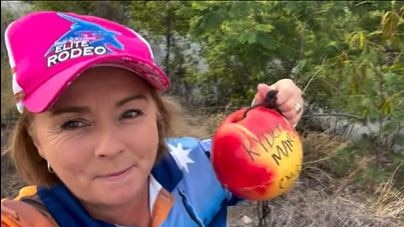 Margie drops a crab pot while delivering a video on the election.