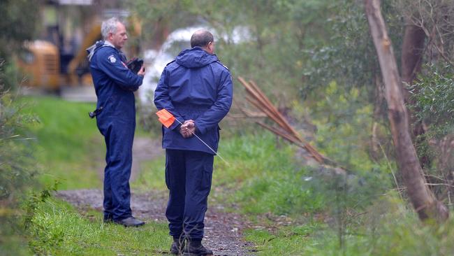 Police and SES search Boronia in 2011.