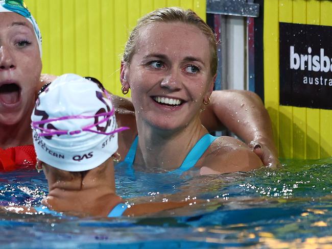 BRISBANE, AUSTRALIA - JUNE 12: Ariarne Titmus of Queensland is congratulated by Lani Pallister of Queensland and Brianna Throssell of Queensland after winning the Womenâs 200m Freestyle Final in a new world record time of 1:52.23 during the 2024 Australian Swimming Trials at Brisbane Aquatic Centre on June 12, 2024 in Brisbane, Australia. (Photo by Chris Hyde/Getty Images)