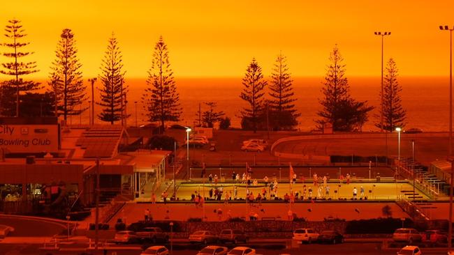 Red haze at Port Macquarie as bushfires ravage the region. Picture: Nine News