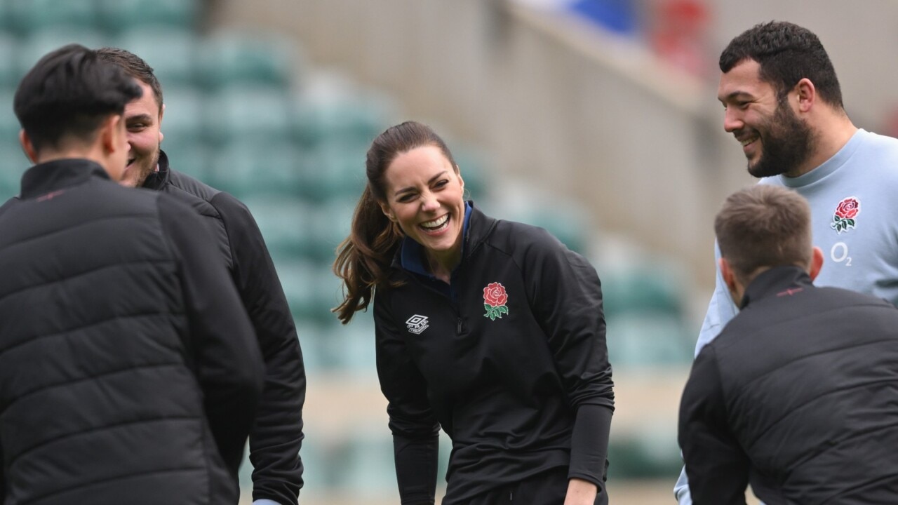 Kate Middleton shows off her rugby skills as she takes on Harry's former role